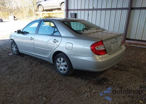 2002 Toyota Camry Le z USA, uszkodzony, nr VIN 4T1BE32KX2U509885